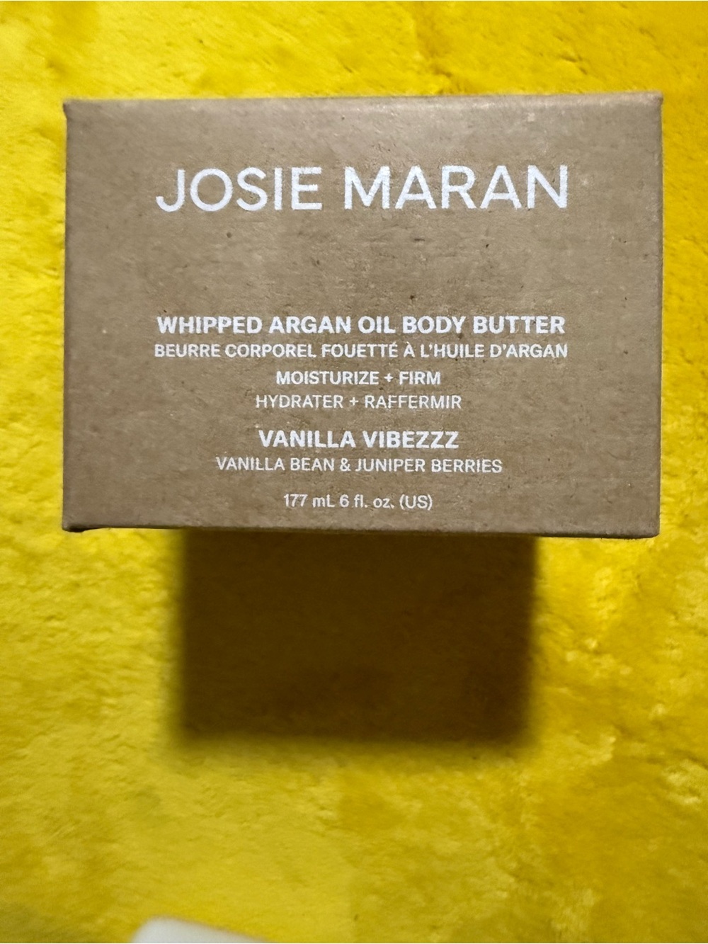 JOSIE MARAN Whipped Argan Oil Body Butter – Brown Box on Yellow Background